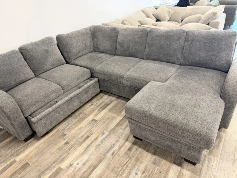 Gray sectional with matching ottoman at DT’s Outlet in Wichita