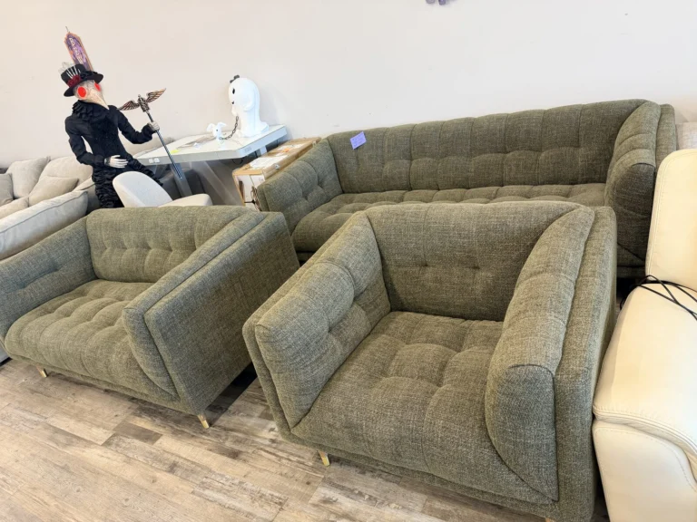 Green tufted sofa and armchair at DT’s Outlet in Wichita