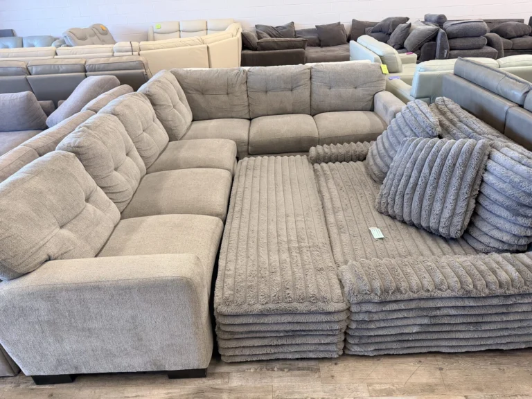 Plush corduroy sectional with pillows at DT’s Outlet in Wichita