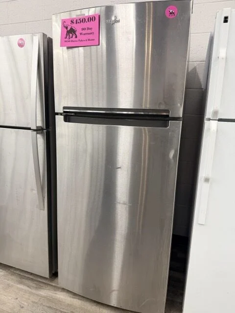 Used Whirlpool stainless steel top-freezer refrigerator at DT's Outlet